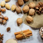 varieties of nuts on white surface
