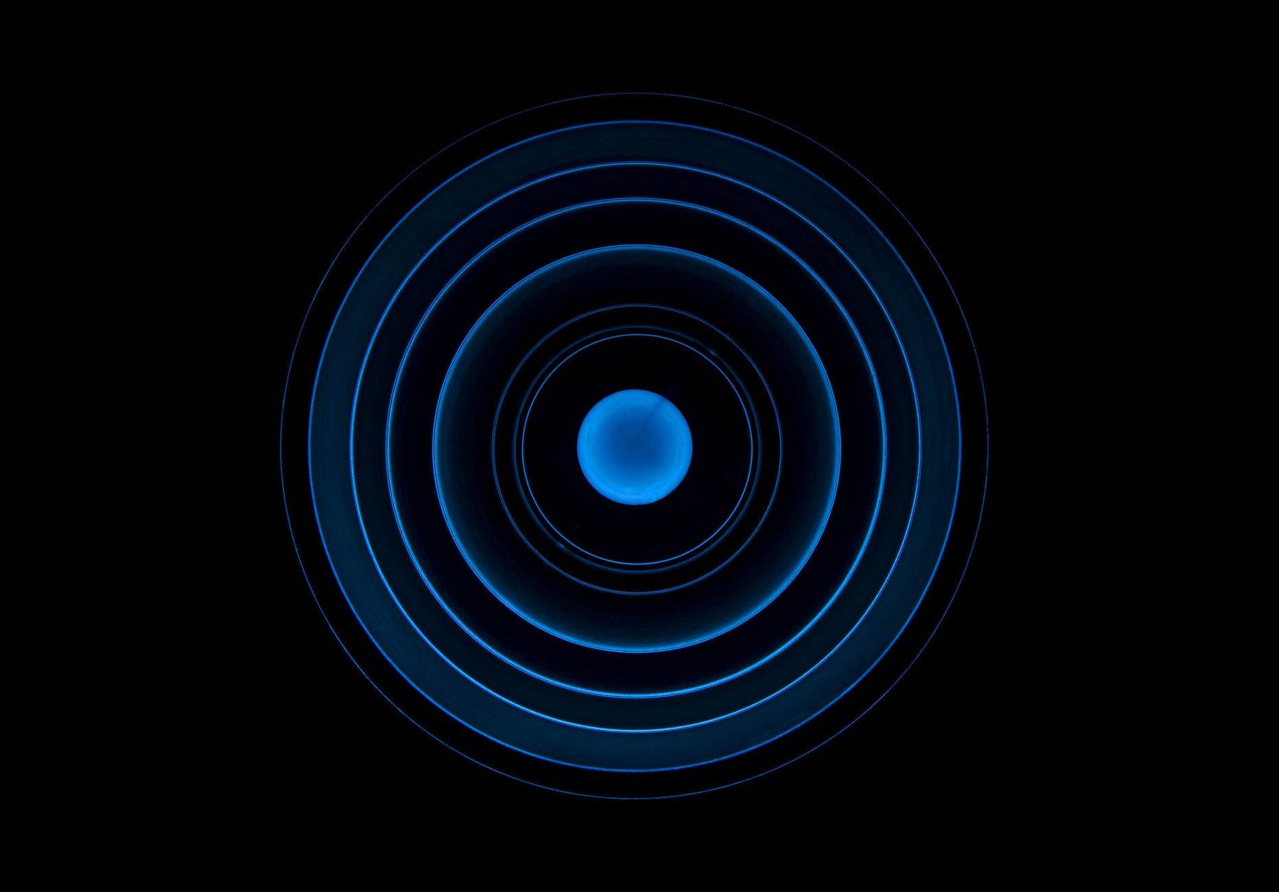 low angle view of spiral staircase against black background
