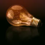 selective focus photography of light bulb