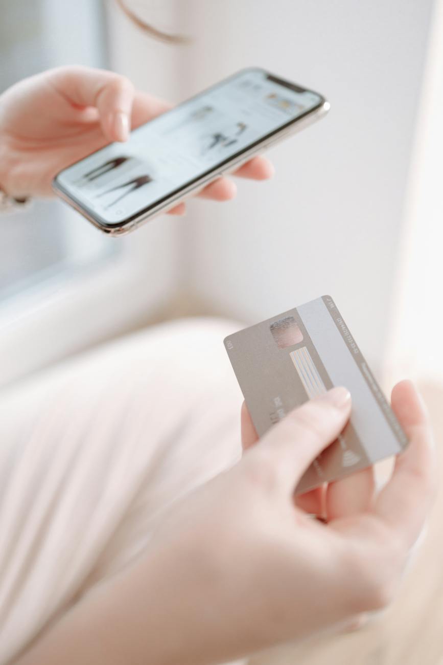 person holding a credit card